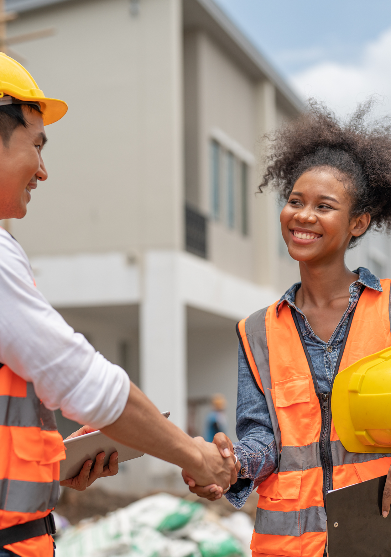 Shaking hands at construction place